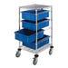 Blue rolling wire drawer cart with three plastic bins, 24" wide and 45" high, designed for easy mobility and storage.