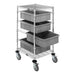 A grey trolley featuring three plastic bins on wheels, measuring 24" W x 45" H, ideal for organized storage solutions.