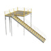 Anti-skid Tuffdeck stairway in yellow and grey, featuring a railing, providing access to a warehouse mezzanine.