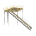  Metal stairway in yellow and grey, equipped with a ladder, leading to a warehouse mezzanine with solid steel grating.