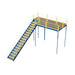 Yellow stairway with a metal railing, designed for access to a warehouse mezzanine constructed of solid steel grating.
