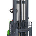 Lithium straddle stacker forklift in green and black, 3000 lb capacity, 177 inches tall, featuring a side-shift mechanism.