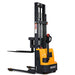 EKKO EB12EA straddle stacker forklift with yellow and black forks, capable of lifting 3000 lbs.