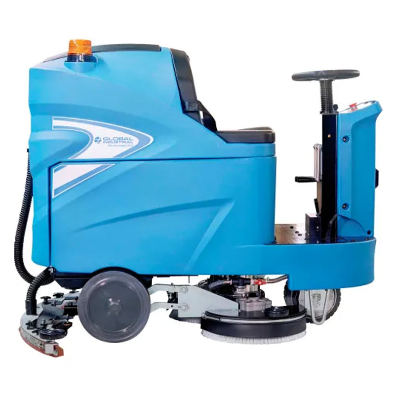 Side view of the blue ride-on floor scrubber showing its seat, steering wheel, scrub decks, and rear squeegee.