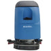 Front view of the blue walk-behind floor scrubber, showing the scrub deck and rear squeegee assembly.