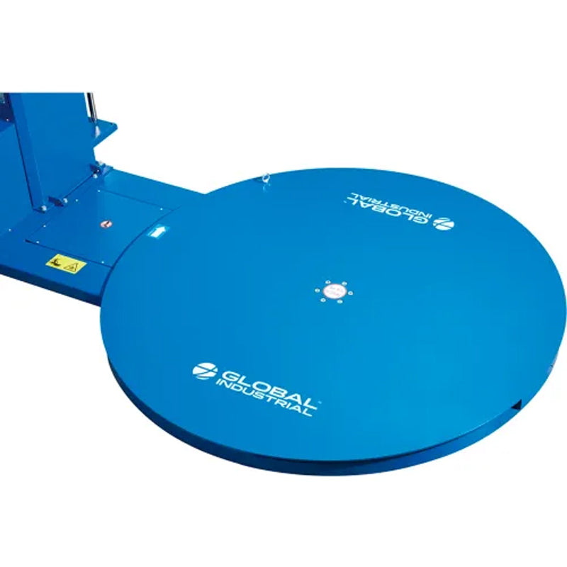 Close-up of the circular turntable on the blue pallet stretch wrapper.