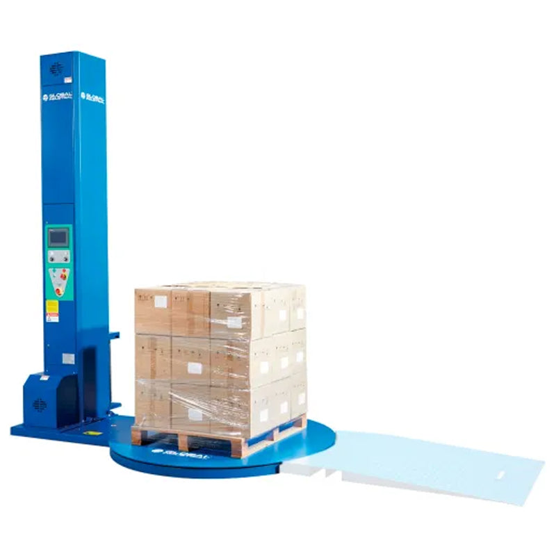 Blue stretch wrapper holding a pallet on its turntable, with the film carriage beside the load.