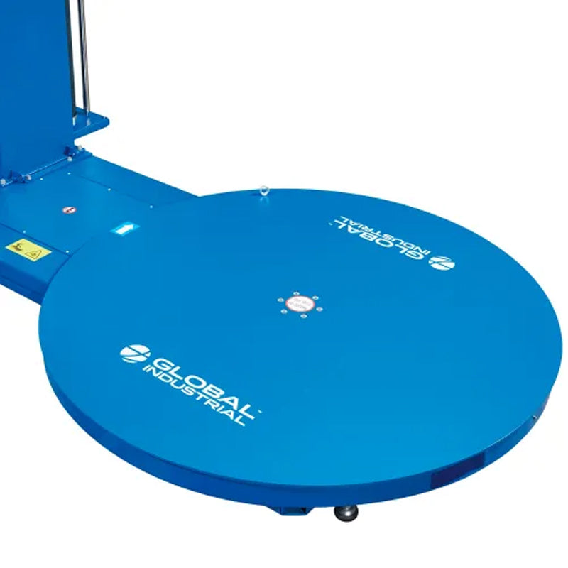 Close-up of the 59-inch circular turntable on the blue stretch wrap machine.