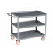 Gray metal rolling cart with three shelves and a 1.5-inch retaining lip for secure storage and transport.