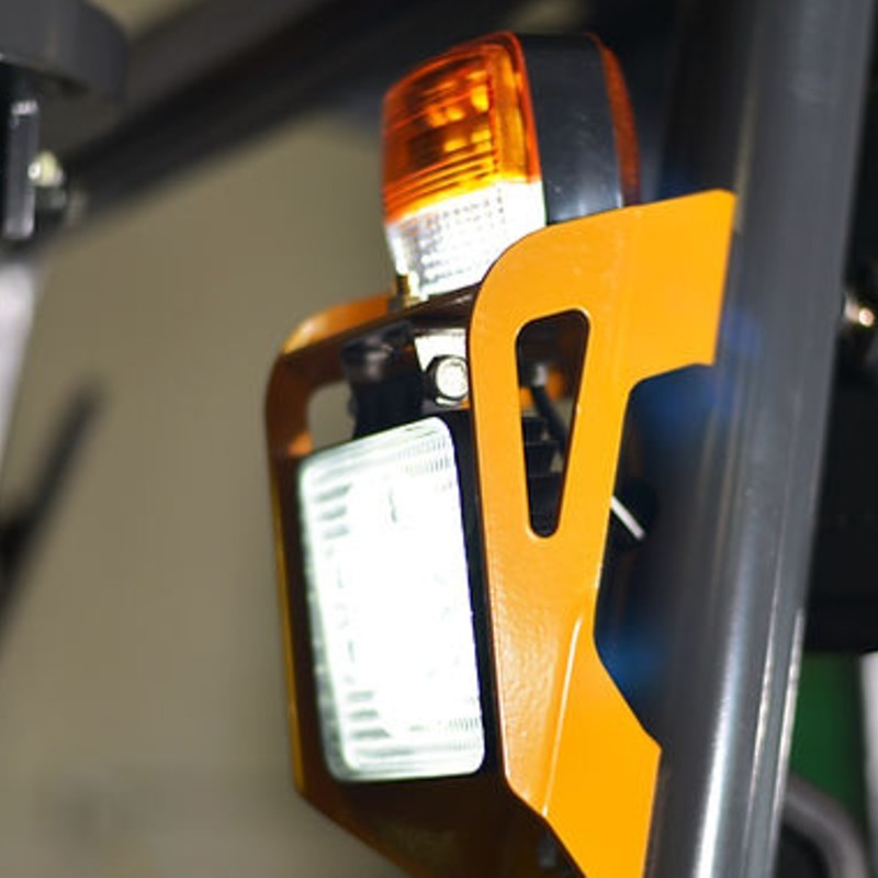 EKKO EK16A-177 three-wheel forklift, lifting capacity of 3500 lbs, with a 177-inch lift height, positioned in a loading area.